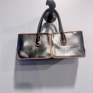 Tod's Elegant Black and Tan Shoulder Bag